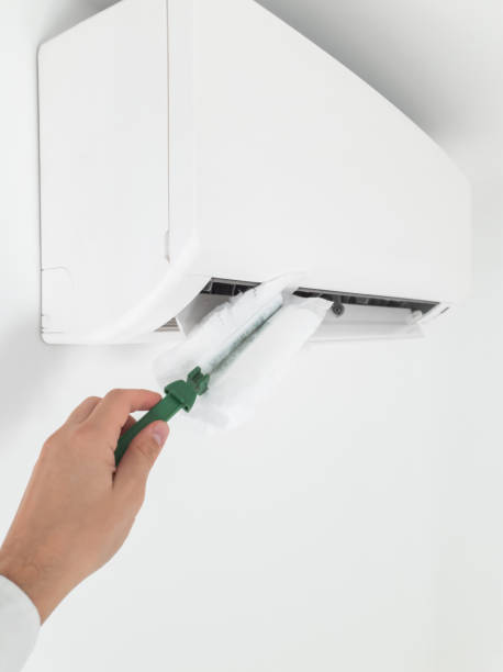 istock Modern air conditioner unit service - cleaning the housing. 1188442745