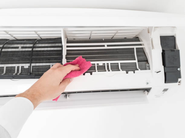 istock Modern air conditioner unit service - cleaning the housing. 1188442770
