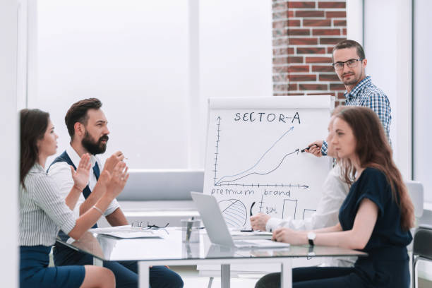 istock businessman discussing with colleagues a new business plan. 1188442805