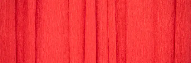 red crepe paper - background with crinkled texture, panoramic banner