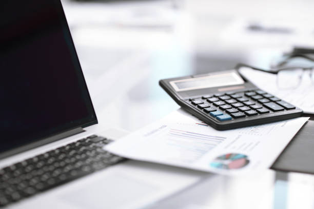 istock close up. calculator on the Desk in the office 1188445016