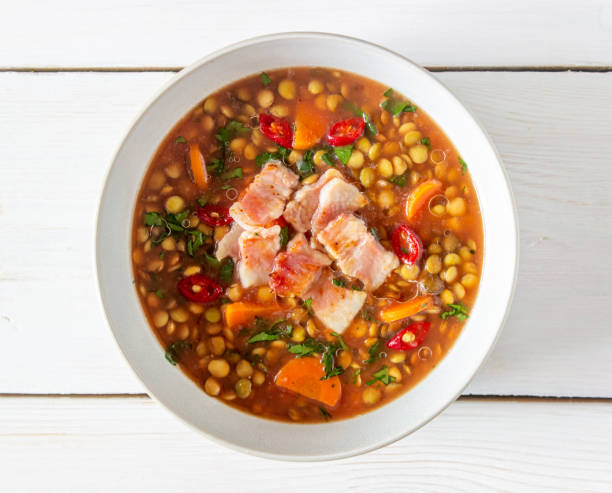 istock Lentil soup with carrots and fried bacon. Recipes. German cuisine. 1188447406