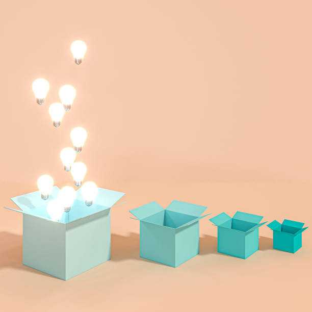 istock classic lit light bulbs coming out of a box 1188448894