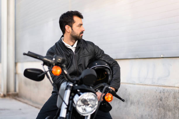 istock Young man on a motorbike 1188449032