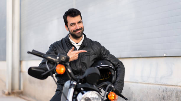 istock Young man on a motorbike 1188449110