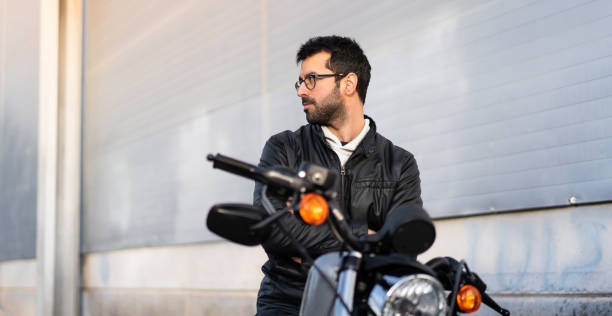 istock Young man on a motorbike 1188449142