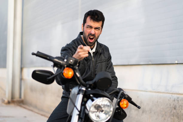istock Frustrated young man on a motorbike 1188449185