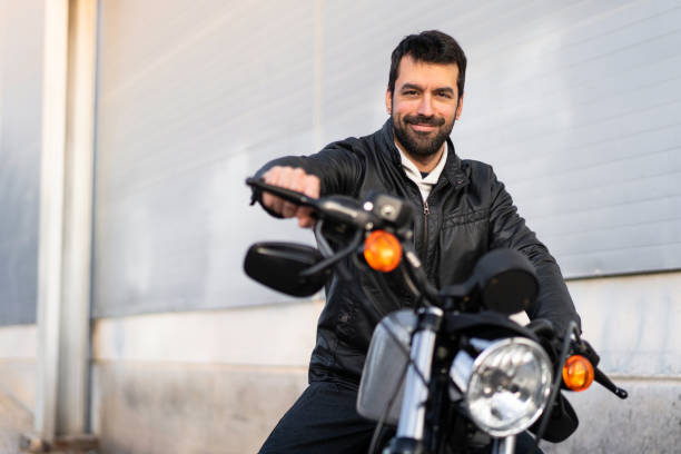 istock Young man on a motorbike 1188449250