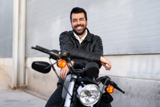 istock Young man on a motorbike 1188449293