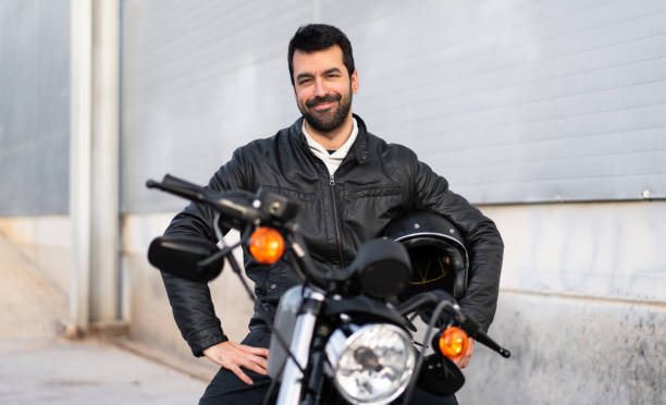 istock Young man on a motorbike 1188449608