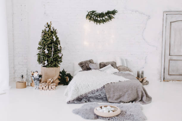 istock Bedroom Decorated Christmas Pine Tree and Gift 1188449611