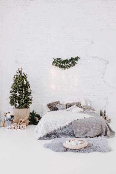 istock Bedroom with Bed, Christmas Tree and Accessories 1188449613