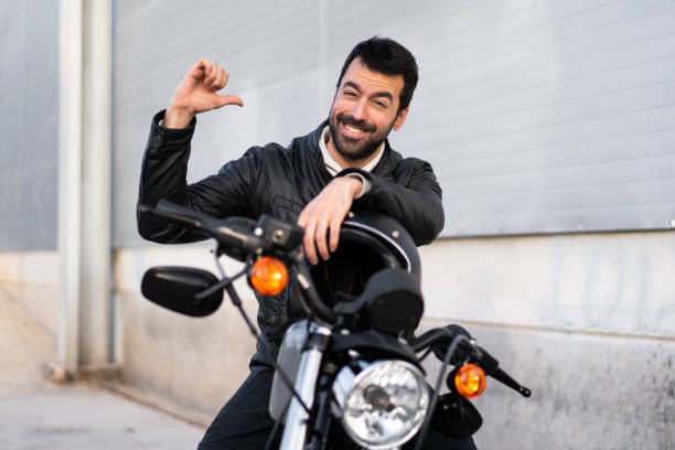 istock Young man on a motorbike 1188450443