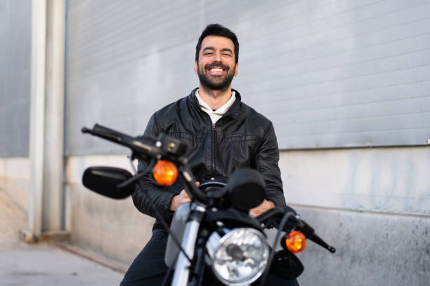 istock Young man on a motorbike 1188450485