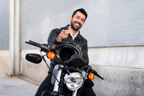 istock Young man on a motorbike 1188450709