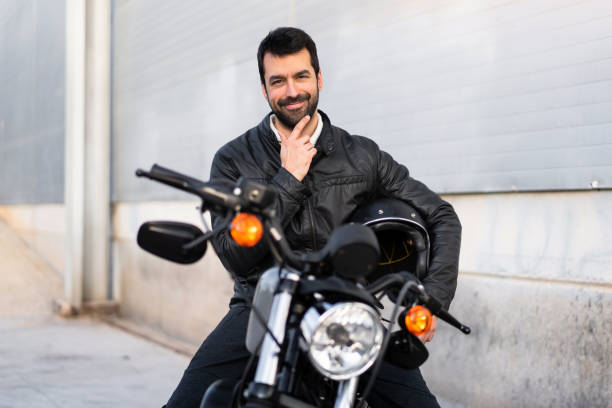 istock Young man on a motorbike 1188450886