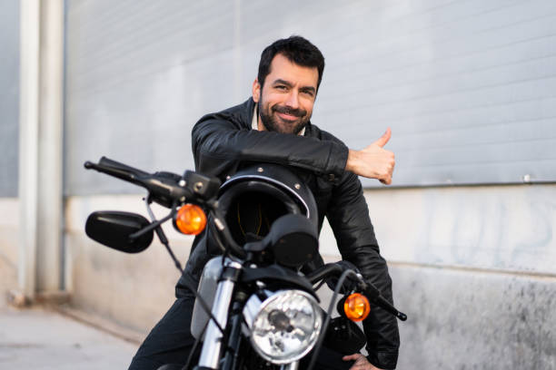 istock Young man on a motorbike 1188451223