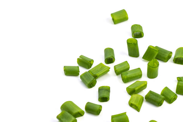 istock Chopped fresh green onions isolated on white background. 1188451431