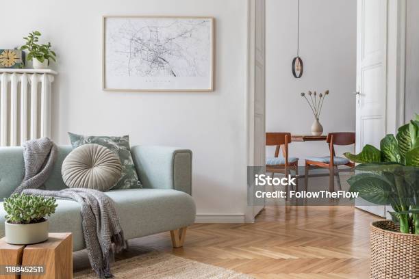 Stylish Scandinavian Living Room With Design Mint Sofa Furnitures Mock Up Poster Map Plants And Elegant Personal Accessories Modern Home Decor Open Space With Dining Room Template Ready To Use Stock Photo - Download Image Now