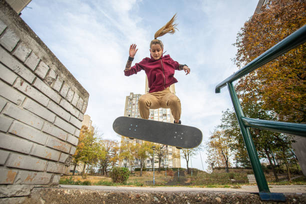 istock Skater woman jumping on her skate. 1188452923