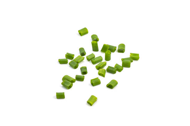 istock Chopped fresh green onions isolated on white background. 1188454050