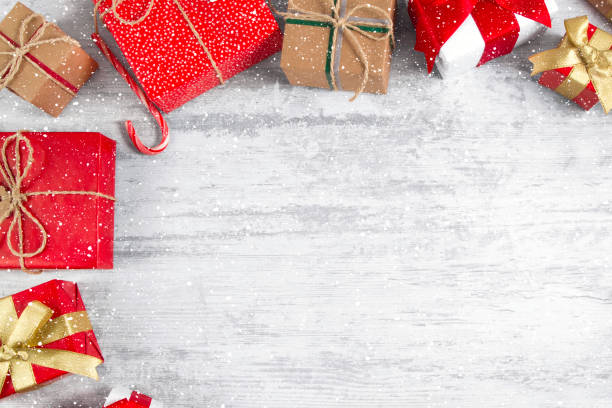 istock Christmas Gift Boxes on Wooden Table 1188454071