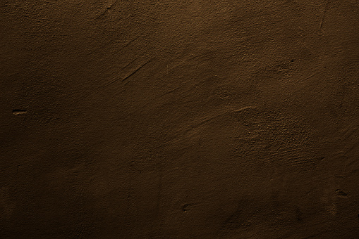 Brown colored background with textures of different shades of brown and bronze