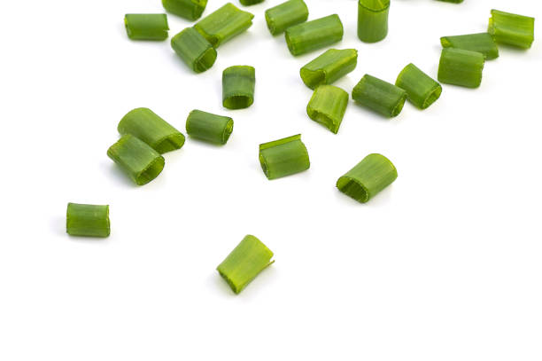 istock Chopped fresh green onions isolated on white background. 1188455805