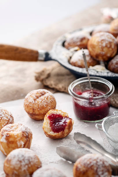 istock Traditional apple pancakes or Aebleskiver in danish. 1188456744