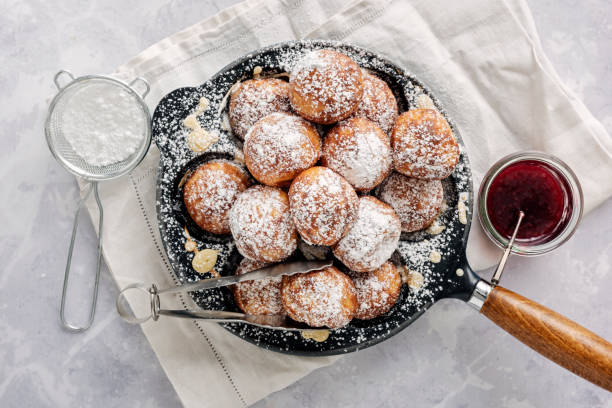 istock Traditional apple pancakes or Aebleskiver in danish. 1188456838