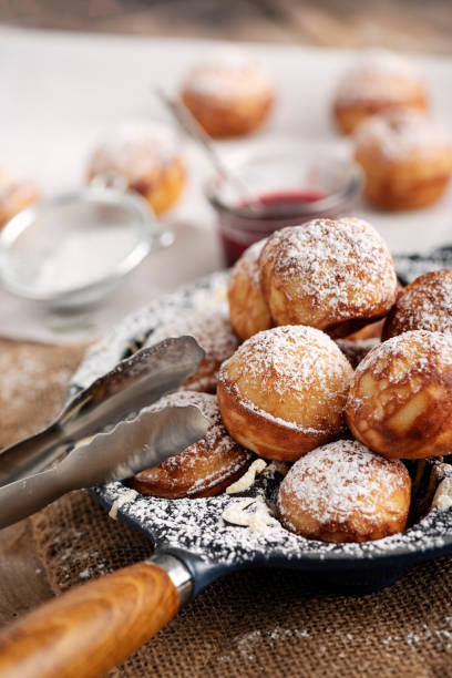 istock Traditional apple pancakes or Aebleskiver in danish. 1188457075