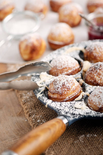 istock Traditional apple pancakes or Aebleskiver in danish. 1188457284