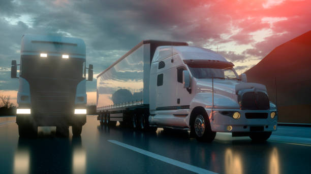 istock Two white trucks on the road, highway. Transports, logistics concept. 3d rendering 1188457348