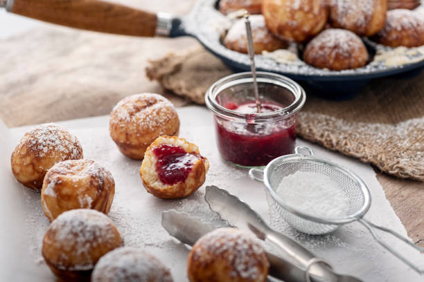 istock Traditional apple pancakes or Aebleskiver in danish. 1188457434