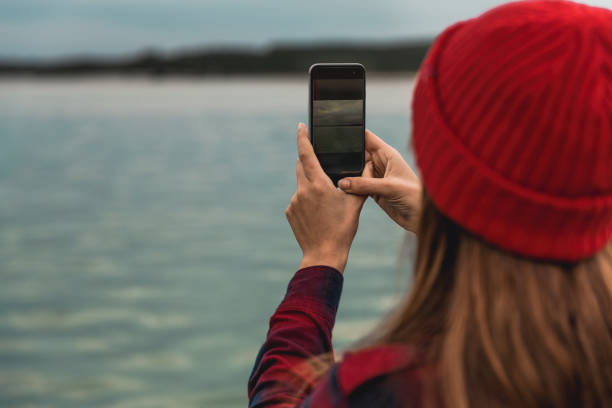 istock Woman taking pictures with a cellphone 1188458491
