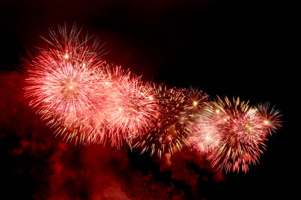 istock Amazing red fireworks on dark background 1188460106