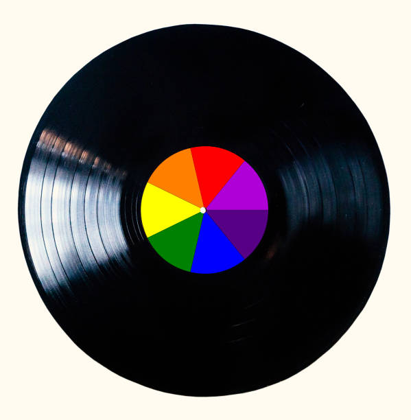 Rainbow black vinyl record isolated on white background.  The rainbow colors are used by the lgbt community. The disk is also called newton disk Rainbow black vinyl record isolated on white background.  The rainbow colors are used by the lgbt community. The disk is also called newton disk italian music stock pictures, royalty-free photos & images