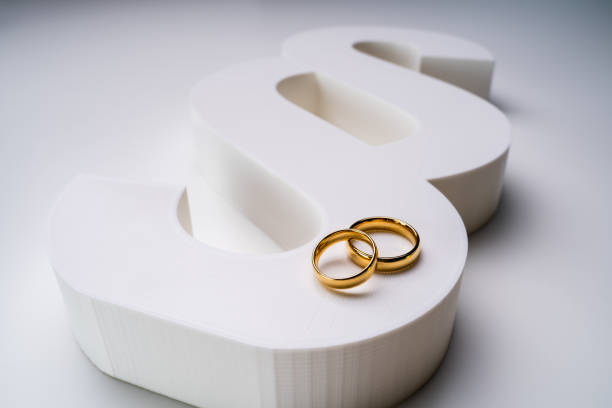 White Paragraph Sign And Golden Wedding Ring Over White Surface White Paragraph Sign And Golden Wedding Ring Showing Marriage And Law Concept symbolic wedding stock pictures, royalty-free photos & images