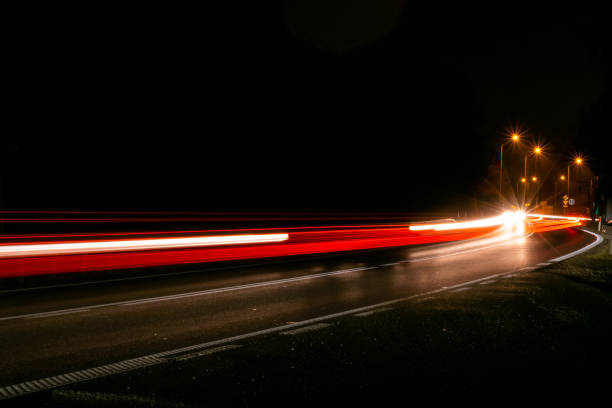 istock lights of cars with night 1188462332