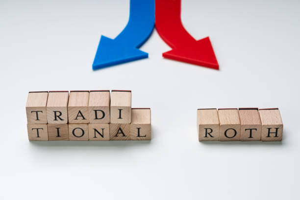 istock Directional Arrows Showing Ira Options On Blocks Over Desk 1188462576
