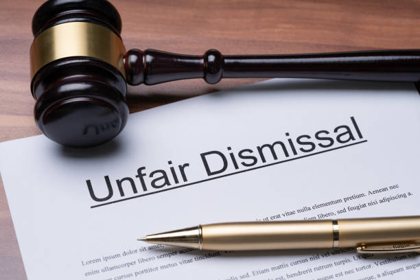 istock Documents Of Unfair Dismissal With Gavel And Pen 1188463067