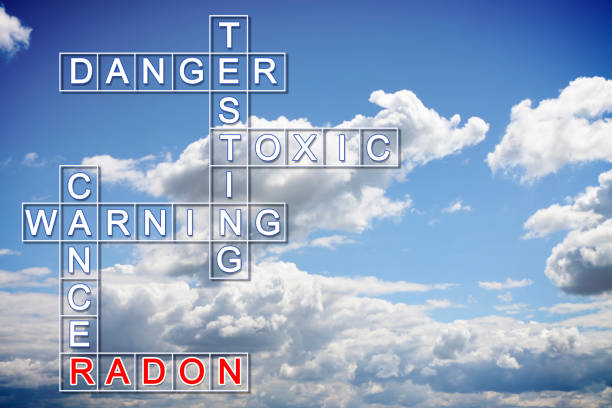 the danger of radon gas - crossword puzzle concept image with copy space - radium imagens e fotografias de stock