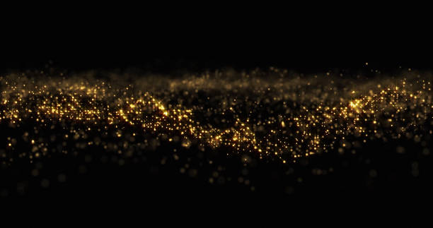 istock Gold glitter wave background, golden glittering particles, bokeh light. Gold glow and shimmering sparkles shine, abstract magic bright sparks 1188464232