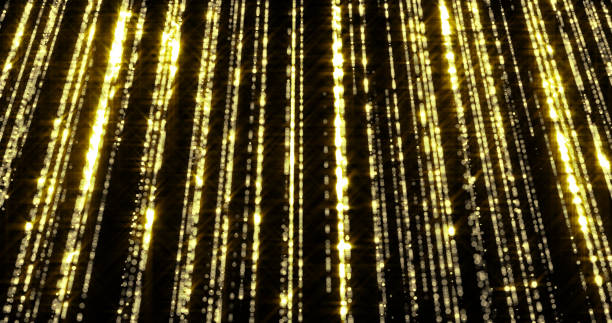 istock Golden glitter flowing particles, sparkling light curtain background. Gold glitter falling sparks, glowing threads and shiny sparkling shimmer glare 1188464309