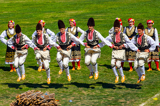 Varvara, Bulgaria - March 24, 2019: Participants from the village of Chelopech at the National Festival Dervishi Varvara 2019, village of Varvara, Pazardzhik Province, Rhodope Mountains