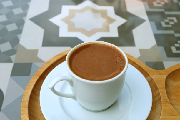 istock Closeup the Texture of Turkish Coffee Served on a Moorish Pattern Stone Table 1188464394