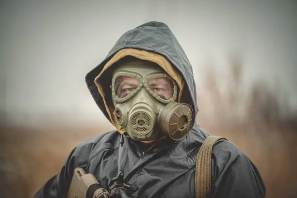 Close up face of soldier in gas mask.