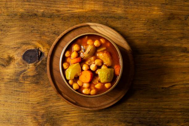 istock Chickpea vegetarian soup on rustic pine wood table 1188472173