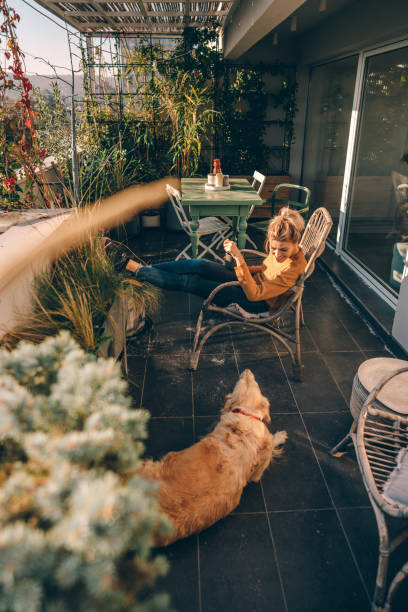 istock Morning coffee with my dog, on the balcony 1188475549