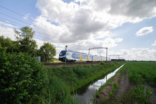 istock Train passing by on a railway in the Netherlands 1188475740